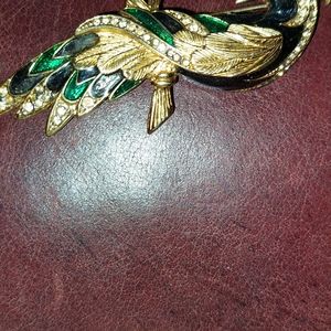 Antique  bird broach green and red gold colours