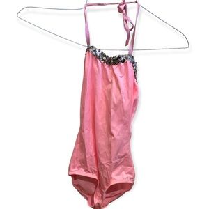 Dansco pink leotard with halter tie and trimmed in silver sequins