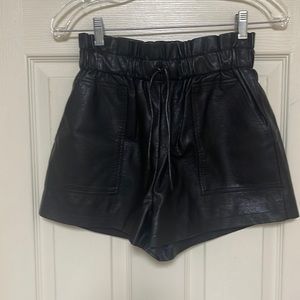 SCHHJZPJ size Medium pleather shorts. Black. Pockets. New!