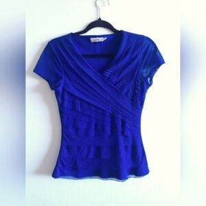 V-neck short-sleeve top with layered mesh design in royal blue