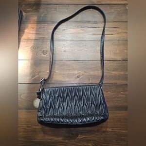 3/20.00. Gussaci crossbody purse