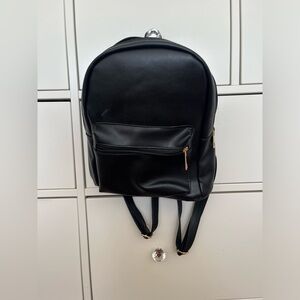 mini backpack in black. great for day trips/activities!