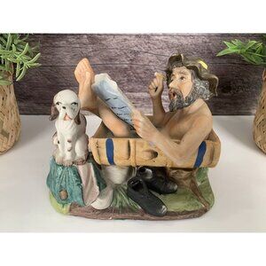 Old man in bath figurine, Smoking Cigar, Reading Racing Form, Dog Watching