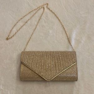 Gold‎ glitter clutch bag