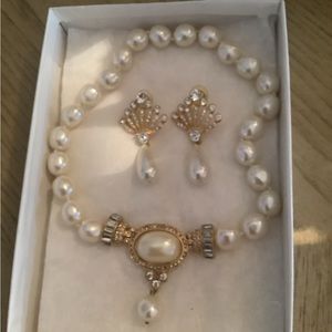 Pearl Necklace and matching earrings studded  stones surround pearls for…