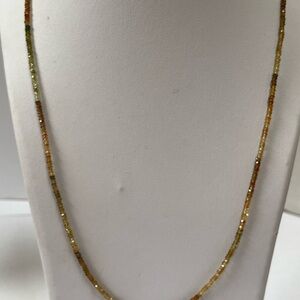 Tourmaline 2mm beads, 20” long with secure clasp 14k gold.