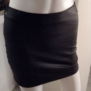 Black faux leather mini skirt Size S zipper in back