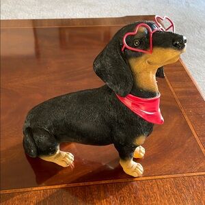 Large black and tan dachshund figurine with adorable heart glasses