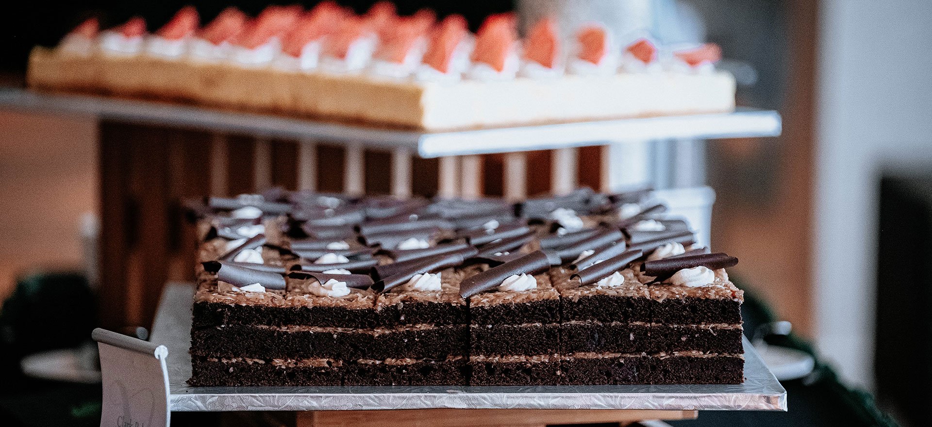 German chocolate cake sheet and cheesecake sheet at a catering event