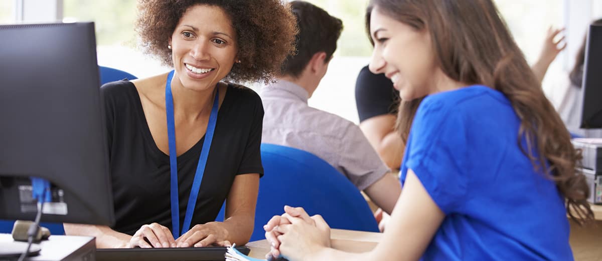 an advisor helps a student