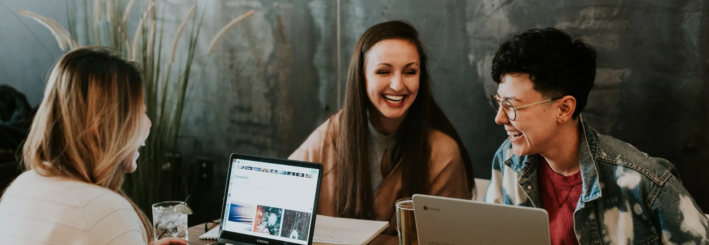 People smiling sitting at the table