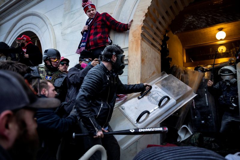 Trump supporters clash with police as they try to storm the U.S. Capitol on Jan. 6, 2021.