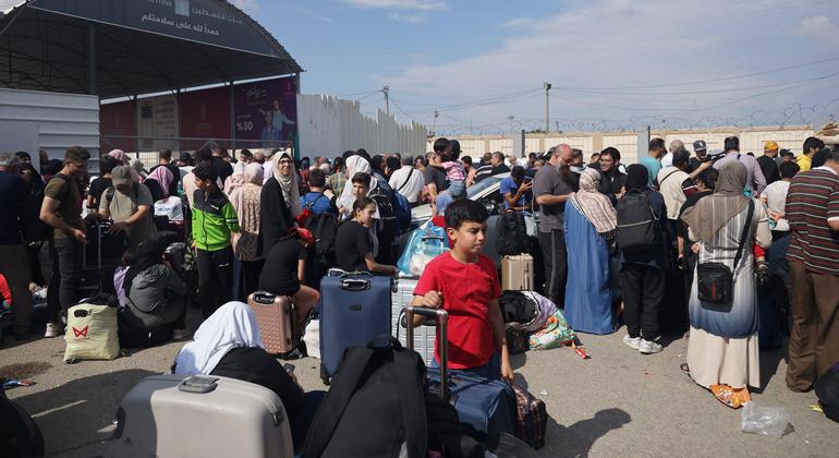 Families gather at the Rafah crossing in the hope of leaving Gaza.