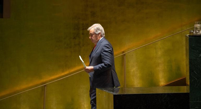 UN Secretary-General António Guterres walks to the podium to address the opening of  General Assembly debate.