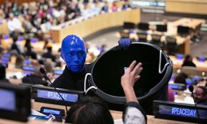 Blue Man Group performs during the International Day of Peace youth observance held on the theme 