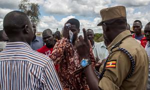 Okello (centre), a community leader in northern Uganda, is trained to de-escalate conflict.