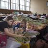 People who have fled Ukraine stay in a temporary shelter near Lublin in Poland.