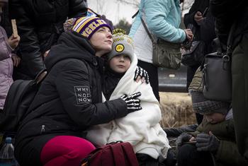 Thousands of Ukrainians seek safety in neighbouring Poland.