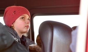 Displaced girls like 11-year-old Anastasia, seen here leaving the Sighetu Marmației border crossing on a bus in northern Romania, are at particular risk.