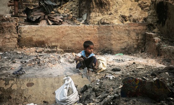 A child rummages through debris after a massive fire devastated the Balukhali area of the Rohingya refugee camps in Cox’s Bazar.