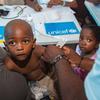 A child is treated for malnutrition at a mobile health clinic in Port-au-Prince, Haiti.