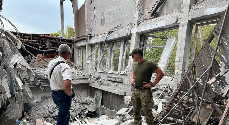 Valery Fedchenko on ruins in the city center of Mykolaiv. 