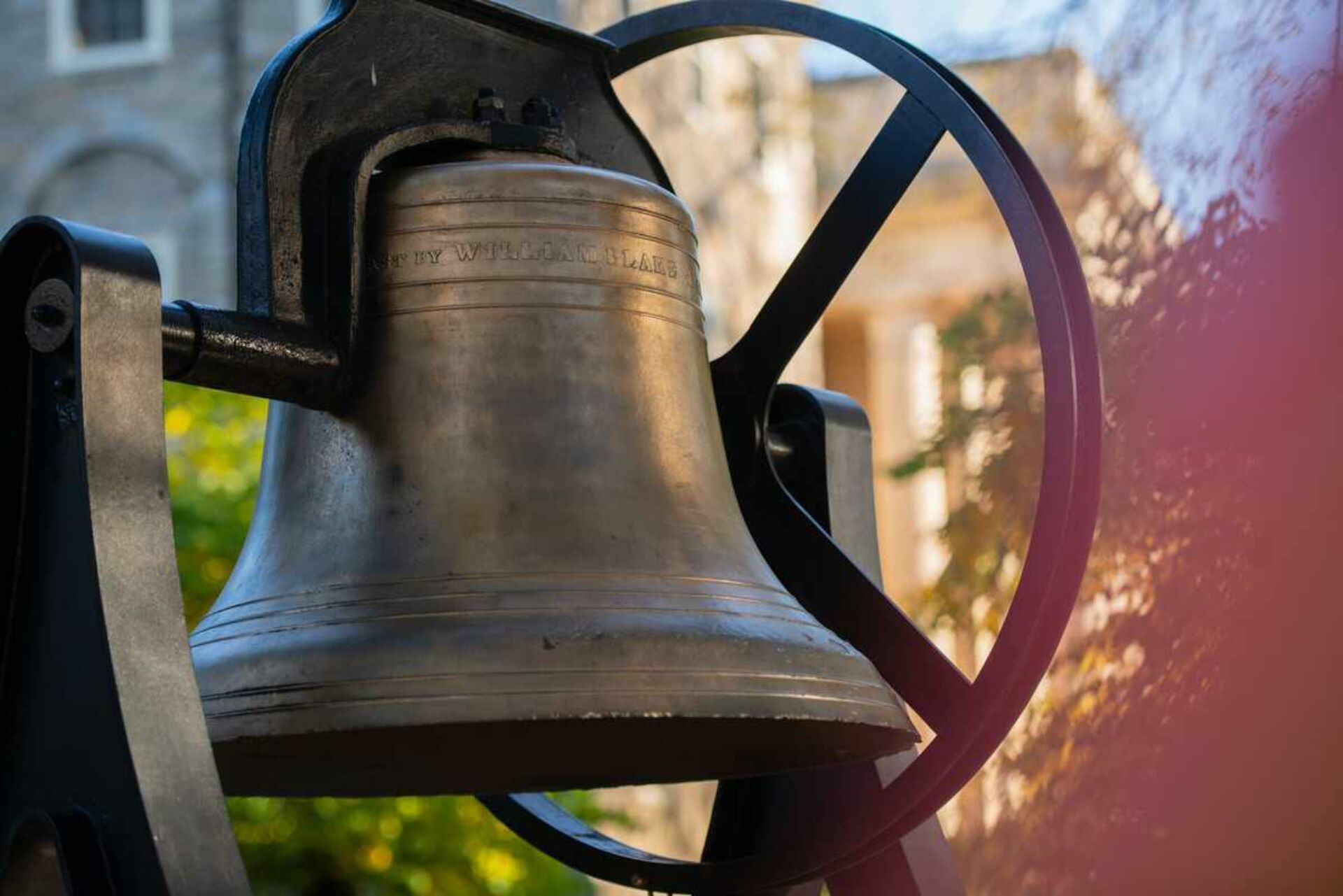 Bronze bell in fall.