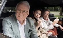 Charles, Mabel, and Oliver in the backseat of a car.