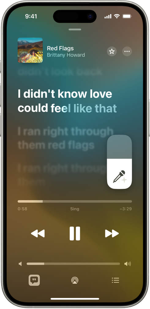 The Now Playing screen showing the Apple Music Sing slider to the right of the lyrics. The currently playing lyrics are highlighted.