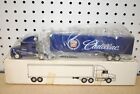 1/64 Ertl White GMC (Volvo) Aero Conventional w/Trailer Cadillac