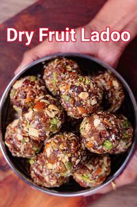 dry fruit laddu recipe | Healthy No Sugar dry fruits ladoo with step-by-step photo and video recipe. Ladoo or Barfi Recipes are very common types of sweets and desserts in Indian Cuisine. It is typically made with flour and sugar and shaped into a ball or like a fudge before it is served. However, there are certain sweets that do not require sugar and dry fruits ladoo is one such hugely popular healthy sweet recipe from Indian cuisine.