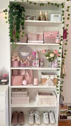 a white book shelf filled with lots of items