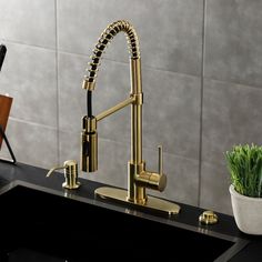 This faucet boasts bold, sleek design with its cylindrical styling. Designed for optimum versatility and functionality, the multiple spray settings and extendable spout of this pre-rinse faucet make for an enjoyable cleaning experience. Additionally, the rotating swivel spout leaves no area of the sink untouched as the industrial look of the exposed spring provides residential function. The brushed brass finish will also provide a long lasting and warm touch to your kitchen ensemble. Matching ac Water Dispensers, Bath Faucet, Kitchen Faucets, Kingston Brass, Updated Kitchen, Matching Accessories, Brushed Brass, Bath Decor, Bathroom Faucets