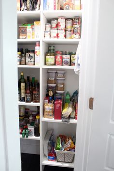 the pantry is stocked with all kinds of food