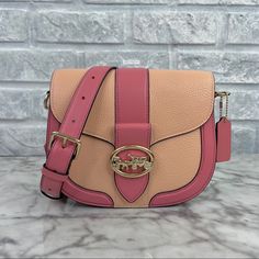 Brand New With The Tag Authentic Color Is Im/Faded Blush/Taffy - A Mauve Pink And Peach Orange Combination Gold Tone Hardware Refined Pebble Leather And Smooth Leather Inside Multifunction Pockets Snap Closure, Fabric Lining Outside Open Pocket Detachable Strap With 20 3/4" Drop For Shoulder Or Crossbody Wear 8 1/4" (L) X 6 3/4" (H) X 2 3/4" (W) Same Or Next Day Shipping! Coach Bag Orange, Chic Pink Saddle Bag For Everyday Use, Pink Satchel Saddle Bag With Detachable Strap, Pink Saddle Bag With Detachable Strap, Pink Saddle Bag With Detachable Strap Satchel, Pink Everyday Use Saddle Shoulder Bag, Pink Saddle Bag For Everyday Use, Pink Shoulder Saddle Bag For Everyday Use, Pink Coach Crossbody Shoulder Bag