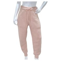 Do not miss out on the Chanel Pre Fall 2021 Pink Alpaca Knit Jogger Sweatpants, a blend of comfort, practicality, and subtle luxury that embodies Chanel's timeless elegance. These jogger-style sweatpants are crafted from a cozy alpaca knit in a beautiful, super light pink hue. The alpaca knit not only provides warmth but also offers a soft and luxurious feel against the skin. With their classic jogger-style design, these sweatpants offer both style and comfort. The jogger silhouette is known for Super Light Pink, Prada Slides, Style Sweatpants, Subtle Luxury, Louis Vuitton Totes, Knit Alpaca, Fashion Joggers, Jogger Sweatpants, Pre Fall