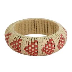 Geometric motifs evoke arrows on a handcrafted bracelet. Designed by Kalyani Gupta this beautiful bangle showcases the textures of woven rattan. Adjustable Woven Bangle Bracelet, Traditional Woven Bracelet Jewelry, Traditional Brown Bangle Jewelry, Handwoven Bangle Cuff Bracelet As Gift, Handwoven Cuff Bangle Bracelet As Gift, Traditional Woven Bracelet, Fair Trade Adjustable Bracelets, Fair Trade Adjustable Jewelry Bracelet, Fair Trade Adjustable Bracelet