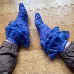 Granny’s Attic Socks from James N. Watts are a frilly, fun, silly pair of socks. This pattern comes with instructions for two ornament styles: a very fluffy and full stockinette mohair two-tiered ruffle, and a doll like simple lace and picot edge two-tiered cufflet. If fancy ruffley socks aren’t your thing, this also makes a perfectly good vanilla sock pattern, as the ruffles are added after completing the sock. Conversely you can absolutely take a hand knit sock you already made from a differen One Skein Sock Yarn Crochet Patterns, Knit Ruffle Socks, Sock Yarn Projects, Knit Sock Pattern, Sock Yarn Crochet, Sock Yarn Knitting Patterns, 2025 Style, Knitting Gifts, Knit Clothes