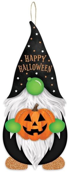 an ornament with a happy halloween gnome holding a jack - o'- lantern