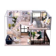 a doll house with furniture and accessories in the living room, dining area and bedroom