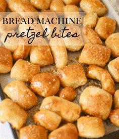 bread machine pretzel bites on a baking sheet with the words, bread machine pretzels