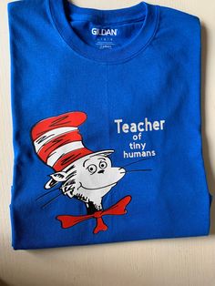 Teachers celebrate Dr. Seuss week with this T or I can customize it with your phrase. Made to order item. Sizes S-XL Dr Seuss Shirt Ideas Diy, Dr Seuss Shirts For Teachers, Dr Suess Cricut Shirt, Dr Seuss Day Shirts Kids, Teacher 1 Teacher 2 Shirts Dr. Seuss, Dr Seuss Preschool Activities, Dr Seuss Preschool, Teen Love, T Shirt Photo