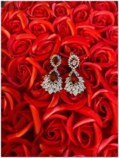 These beautiful earrings are ruby red diamonds. Beautiful piece for special occasions. Luxury Red Ruby Bridal Earrings, Luxury Dazzling Ruby Earrings, Luxury Red Ruby Earrings, Red Ruby Earrings With Diamond Accents, Luxury Ruby Chandelier Earrings, Red Diamond, Ruby Diamond, Ruby Red, Chandelier Earrings