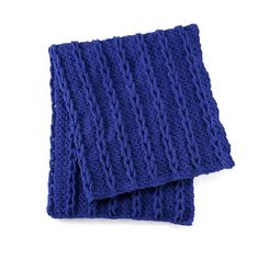 two blue knitted scarves sitting on top of each other