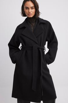 Belted Coat Black Luxury Black Belted Wool Coat, Luxury Classic Belted Outerwear, Winter Belt Wool Coat, Luxury Winter Outerwear With Tie Waist, Luxury Long Sleeve Wool Coat With Self Belt, Black Belt Coat, Luxury Belted Business Outerwear, Luxury Women's Belted Wool Coat, Luxury Belted Long Wool Coat