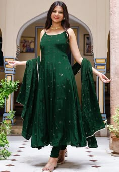 Faux Crepe Anarkali Kameez in Dark Green. This Readymade Sleeveless attire with Shantoon Lining is Enhanced with Resham and Sequins Work, Along with Gota Lace Work on Dupatta .Crafted in Round Neck. Available with a Shantoon Churidar in Dark Green and a Faux Crepe in Dark GreenThe Kameez and Bottom Lengths are 50 and 45 inches respectively. We sell all kinds of salwar kameez sets for women Georgette Salwar Kameez | Crepe Salwar Kameez | Art Silk Salwar Kameez | Velvet Salwar Kameez | Chiffon Sal Crepe Dress Indian, A Line Salwar Suits, Party Churidar Designs, Anarkali Sets For Women, Sleeveless Suits For Women Indian, Anarkali Dress Sleeveless, Dark Green Punjabi Suit, Dark Green Anarkali Dress, Green Sleeveless Traditional Wear With Zari Work