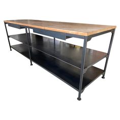 an industrial style table with two shelves and one shelf on the bottom is made out of metal