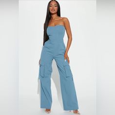 Fashion Nova Light Blue Cargo Tube Top Pant Outfit. Brand New With Tags Attached Was Too Small For Me. Size Xs Fitted High Waist Cotton Strapless Jumpsuit, High Waist Strapless Jumpsuit With Pockets, Trendy Fitted Strapless Jumpsuit With Pockets, Trendy High Waist Strapless Jumpsuit With Pockets, Trendy Strapless High Waist Jumpsuit With Pockets, Casual Blue Full-length Jumpsuits And Rompers, Fitted High Waist Strapless Jumpsuit With Pockets, Fitted High-waist Strapless Jumpsuit With Pockets, Fitted High Rise Blue Cargo Pants