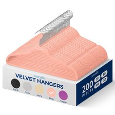 the velvet hangers are in a box with different colors and designs on it's sides