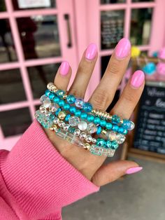 Add a pop of color with our vibrant blue Fairy Stack Bracelet! Perfect for a playful touch to any outfit. Stack 'em up and make a statement. Choose to purchase the full stack or an individual bracelet. 1 bracelet for $9 or 5 for $38 - Discount Applied at Checkout Lead & Nickel Free Bracelets are 'one size fits most' and are designed to fit wrists up to 7.5" comfortably. Please be aware that due to the unique and handmade nature of each product, colors, shapes, and bead sizes may vary slightly fr Stretch Beaded Bracelets Diy, Teal Bracelet, Stack Bracelet, Bead Sizes, Blue Fairy, Wedding Greeting Cards, Bracelets Diy, Free Bracelet, Bracelet Diy